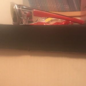 Red and white safety sunglasses.